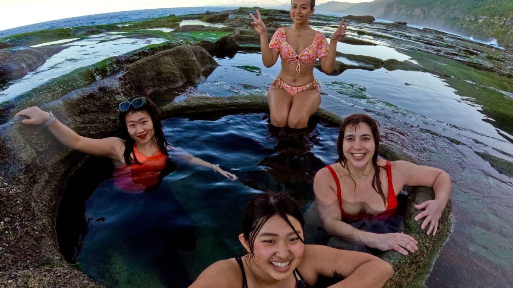 Group swimming at the Eight Figure Pool in Royal National Park