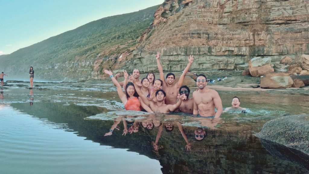 Group hiking to the Eight Figure Pool on the Royal National Park coastal track