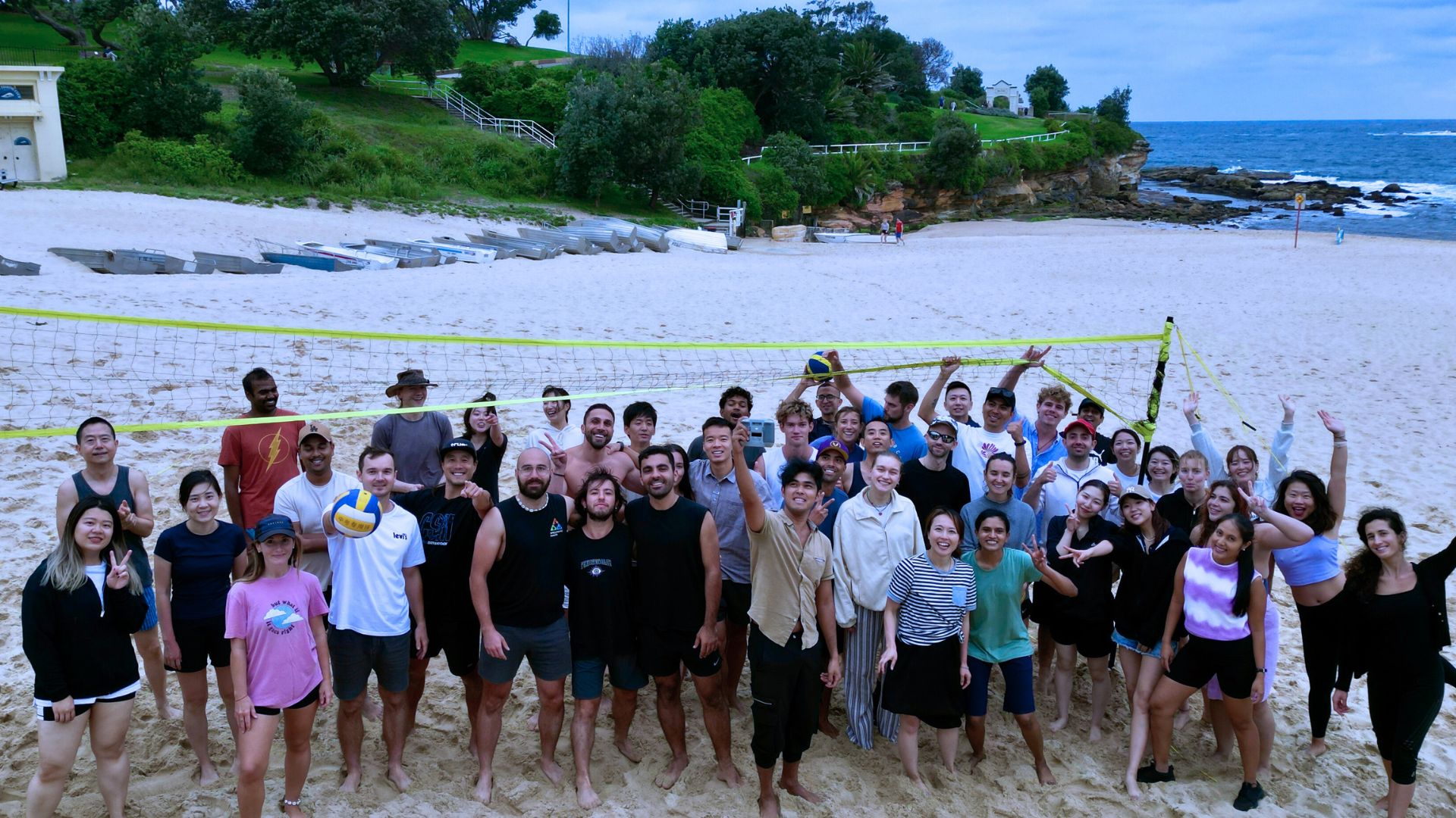 Sydney Beach Volleyball Community playing social volleyball on the beach in Sydney